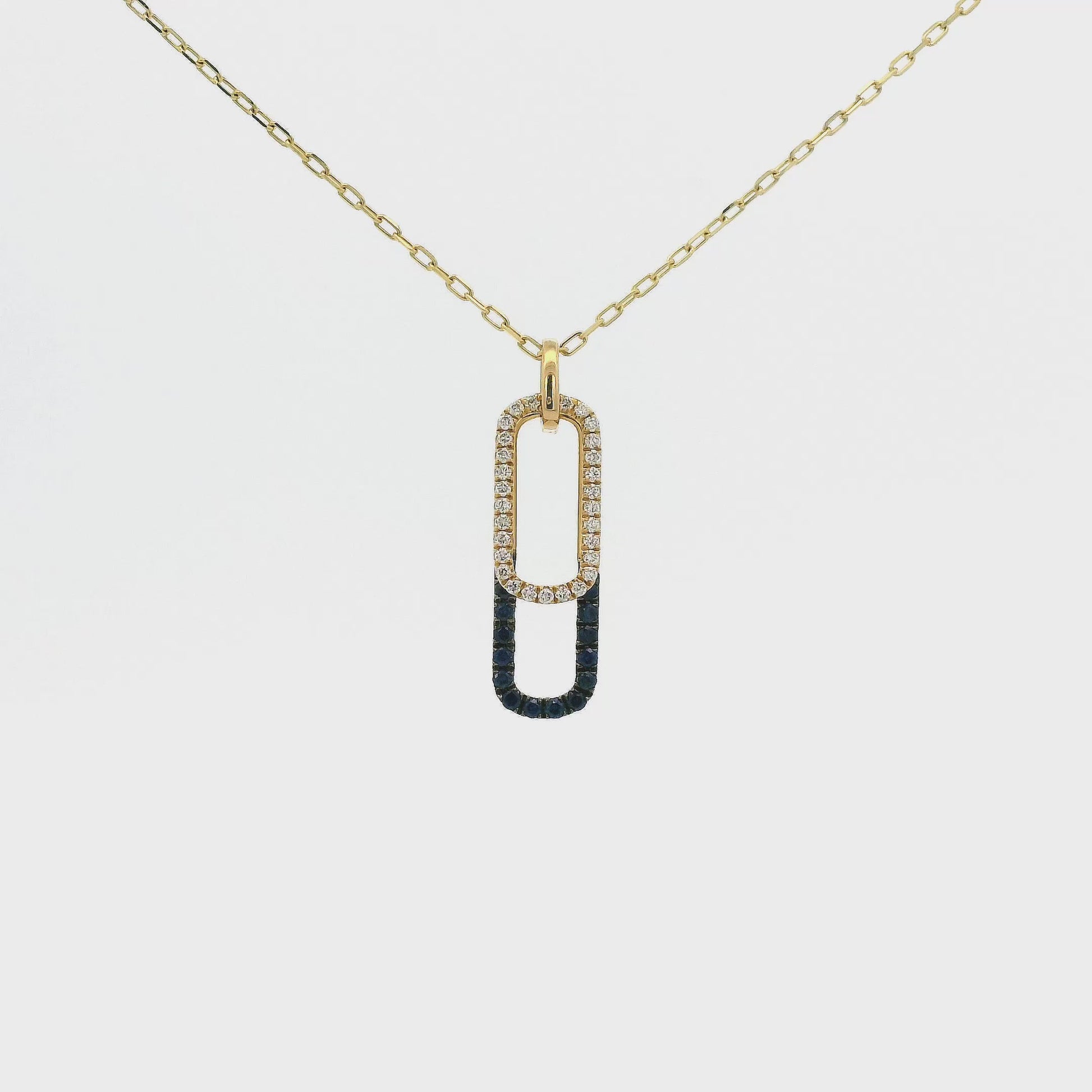 A Yellow Gold Pendant with two ovals, one with Natural Blue Sapphires and the other with Natural Diamonds at Forever Rox Fine Jewelry, Lake Tahoes Best Jewelry Store
