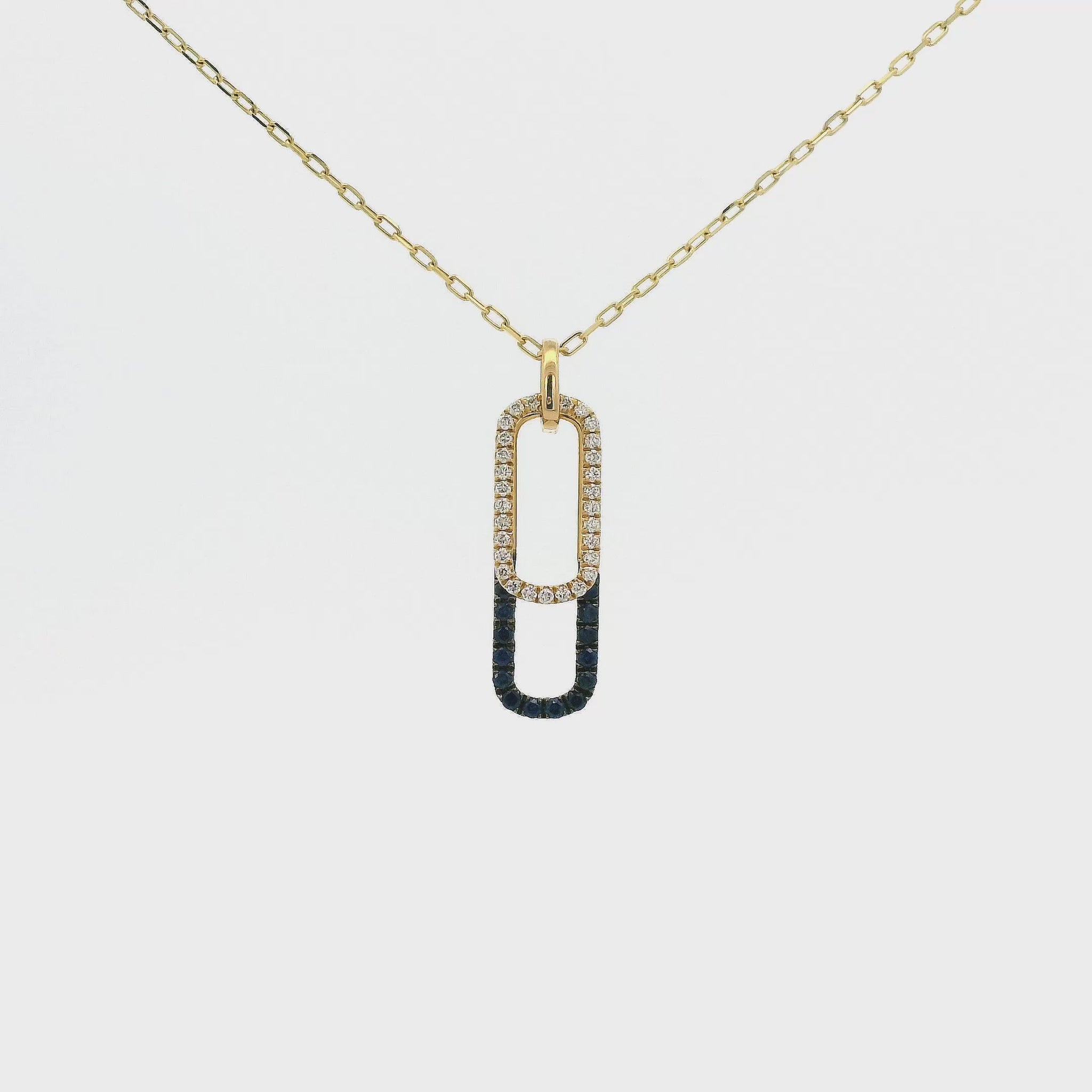 A Yellow Gold Pendant with two ovals, one with Natural Blue Sapphires and the other with Natural Diamonds at Forever Rox Fine Jewelry, Lake Tahoes Best Jewelry Store