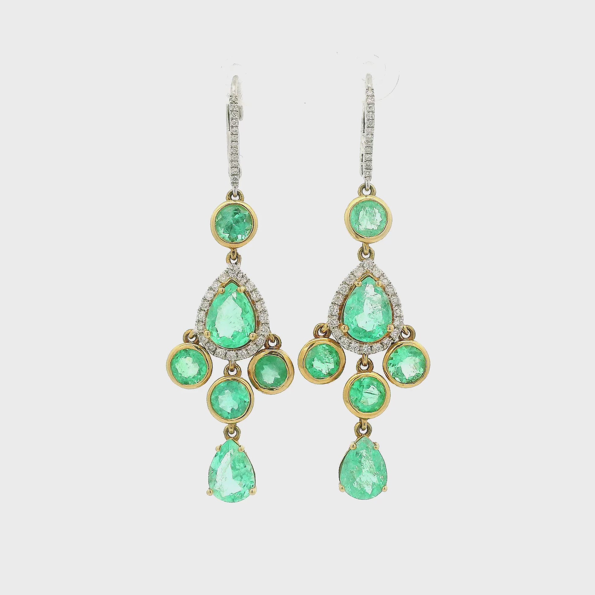 Pair of dangle earrings with Mint Emeralds and Diamonds in yellow and white gold