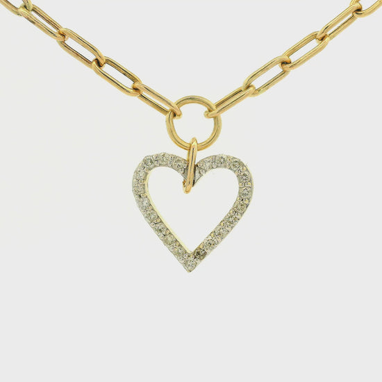 A gold heart-shaped pendant necklace with a pavé diamond outline, suspended from a gold paperclip chain on a white background at Forever Rox Fine Jewelry, Lake Tahoes Best Jewelry Store