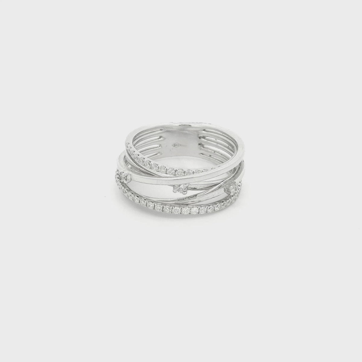 A White Gold Crossover Ring with a natural diamonds at Forever Rox Fine Jewelry, Lake Tahoes Best Jewelry Store
