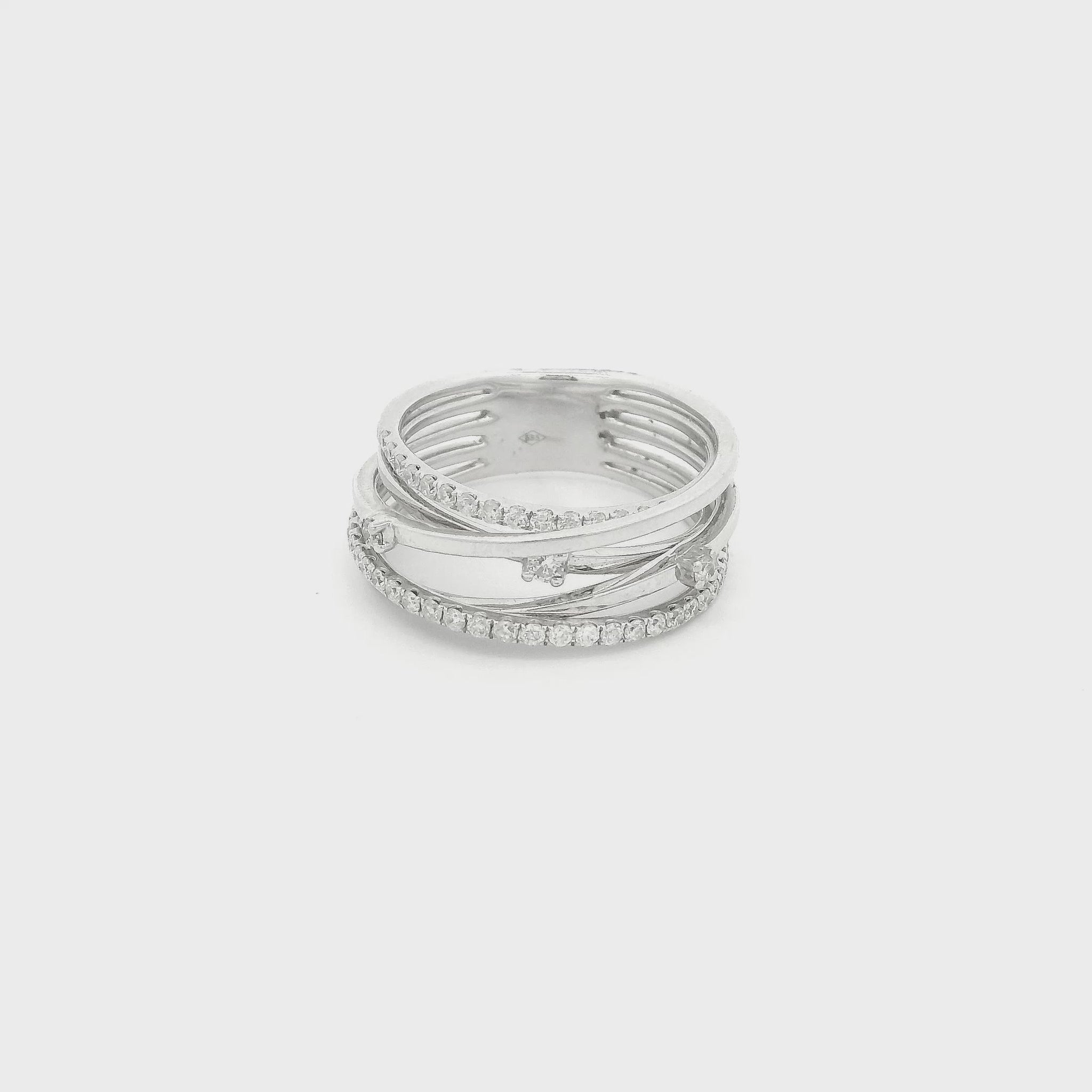 A White Gold Crossover Ring with a natural diamonds at Forever Rox Fine Jewelry, Lake Tahoes Best Jewelry Store
