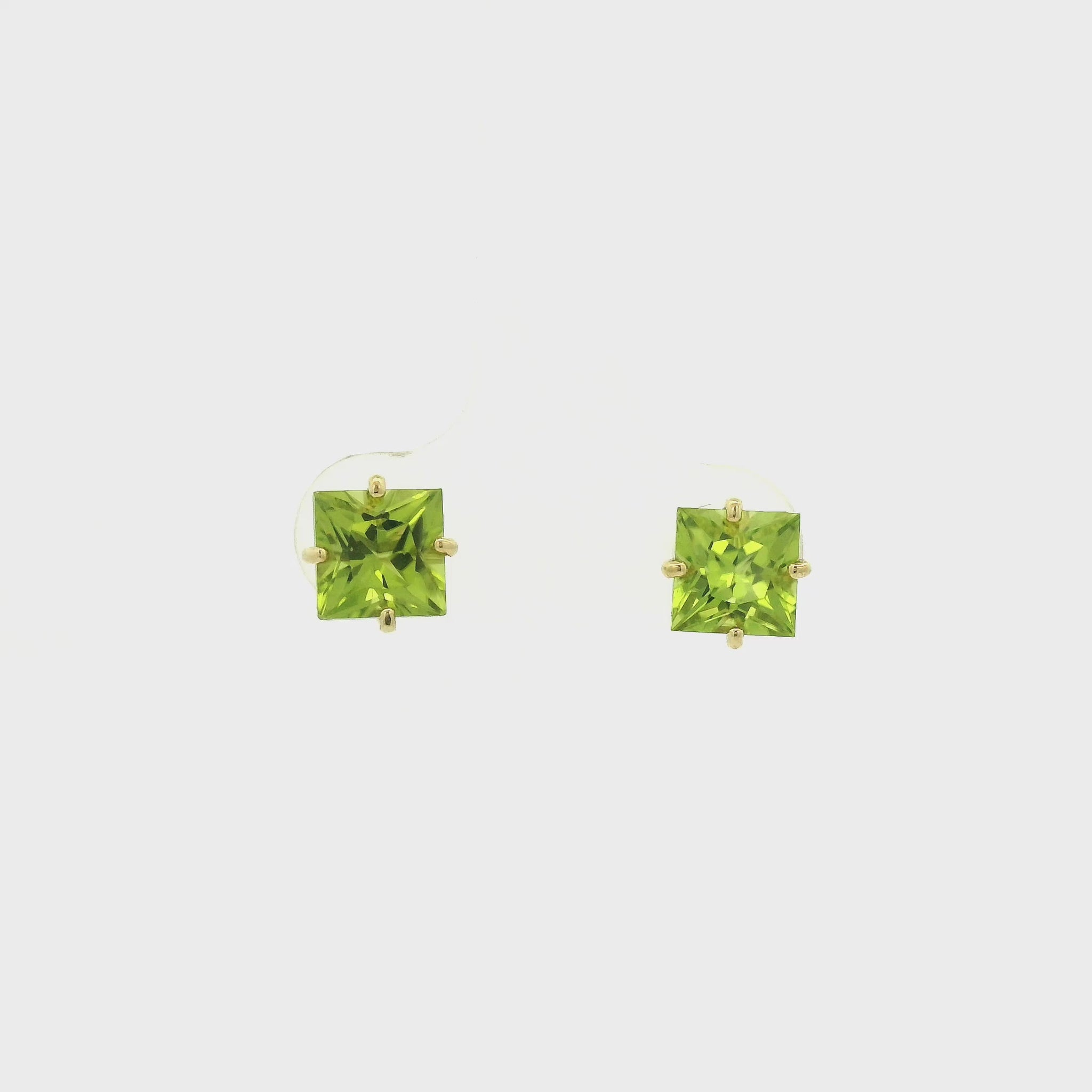 A Pair of Yellow Gold Stud Earrings with prong set princess cut natural Peridot at Forever Rox Fine Jewelry, Lake Tahoes Best Jewelry Store