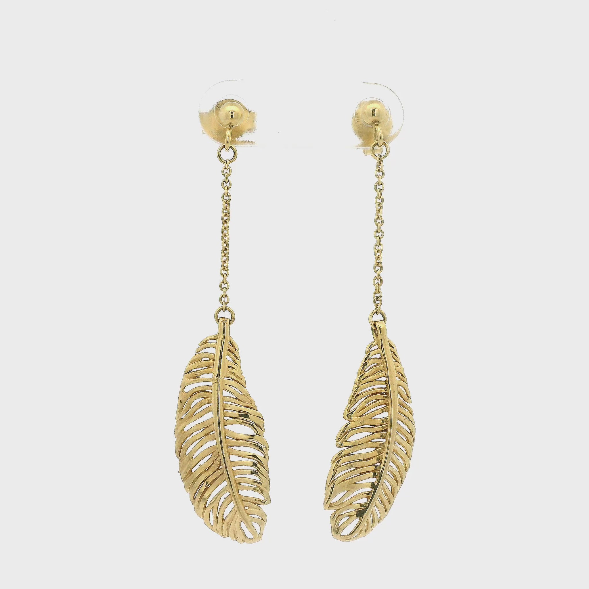 Yellow Gold Feathers Dangling From Ball Studs with a Chain at Forever Rox Fine Jewelry 