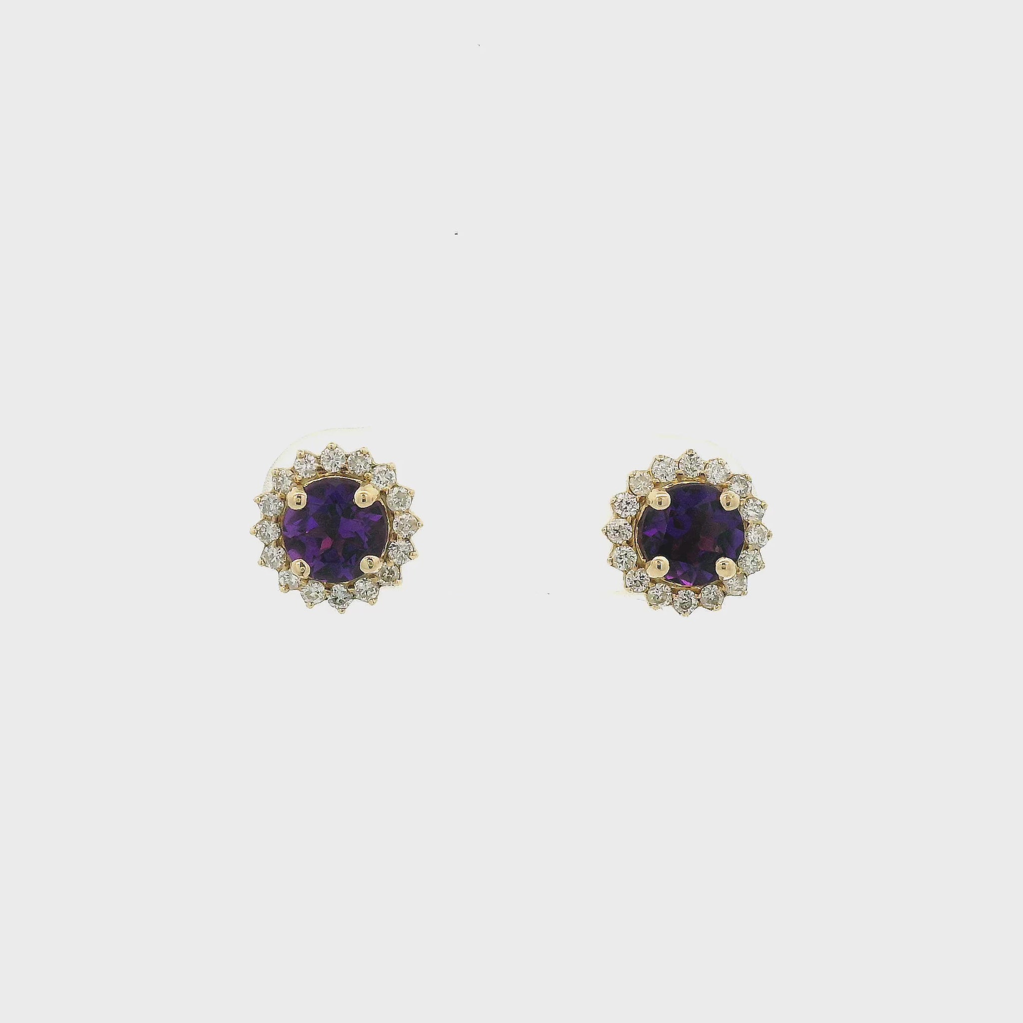 A Yellow Gold Pair of Studs with prong set round cut natural Amethyst in the center with a halo of diamonds at Forever Rox Fine Jewelry, Lake Tahoes Best Jewelry Store