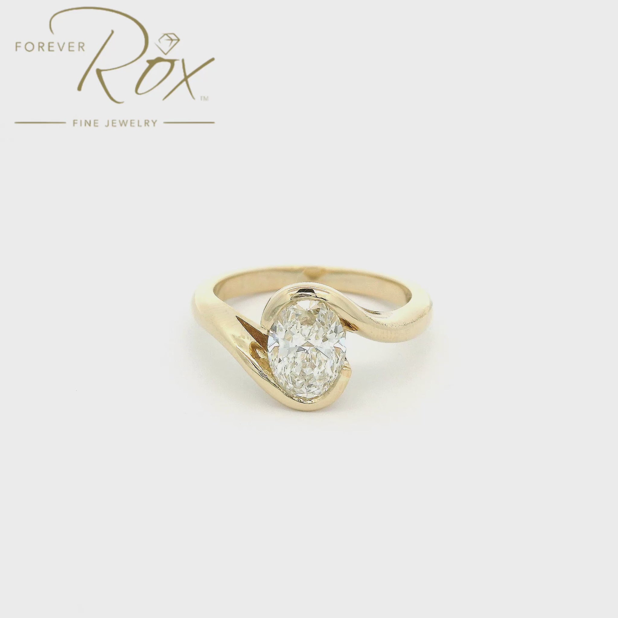 Yellow gold ring with a 1.03ct oval cut diamond set in the center custom made at Forever Rox Fine Jewelry