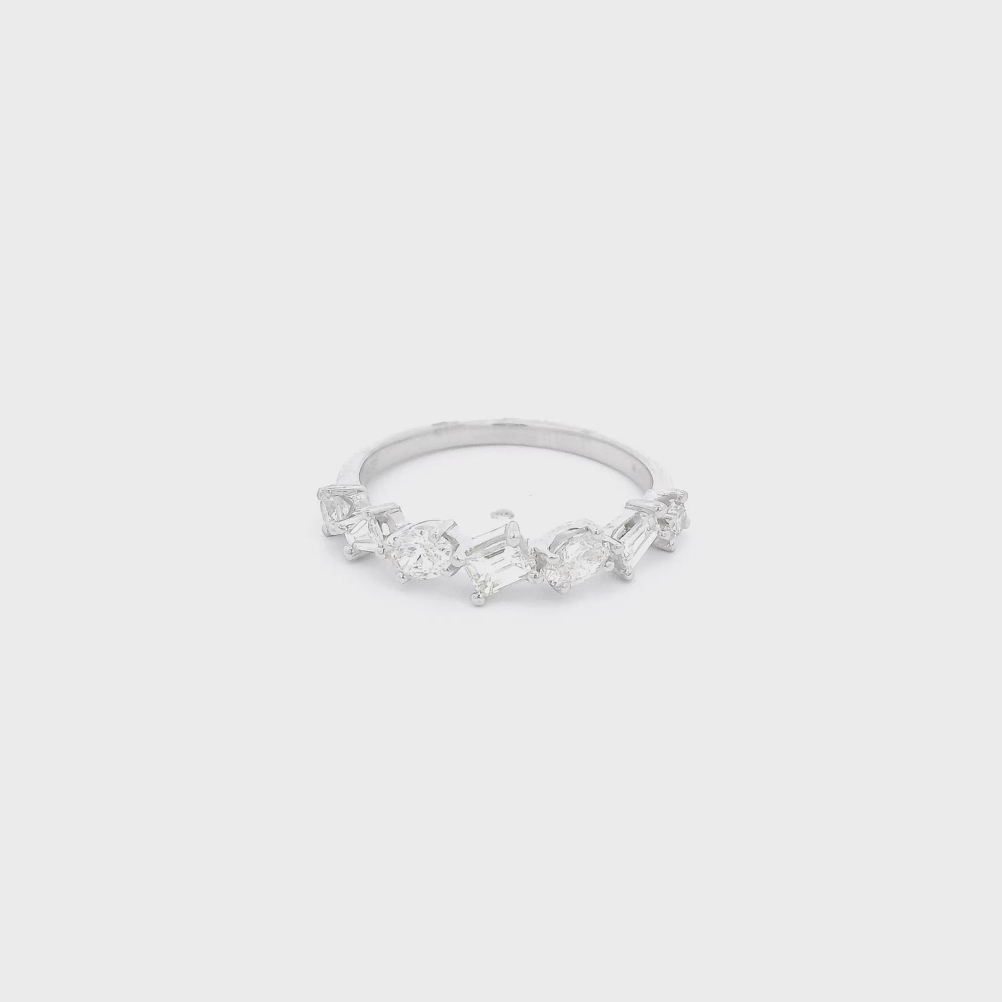 A White Gold Ring with emerald, oval, round & tapered baguette cut natural Diamonds at Forever Rox Fine Jewelry, Lake Tahoes Best Jewelry Store