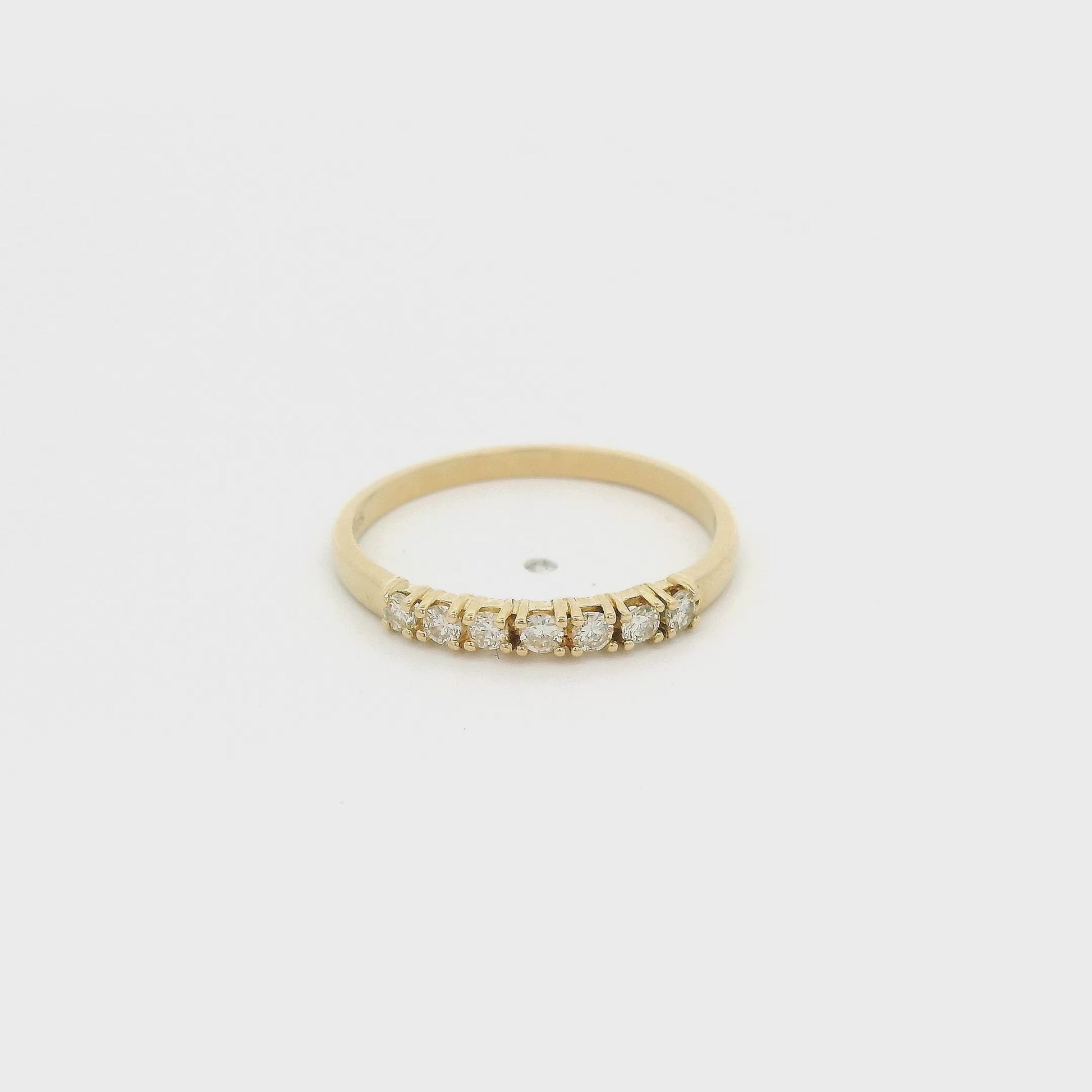 A Yellow Gold Wedding Band with seven round cut Diamonds at Forever Rox Fine Jewelry, Lake Tahoes Best Jewelry Store