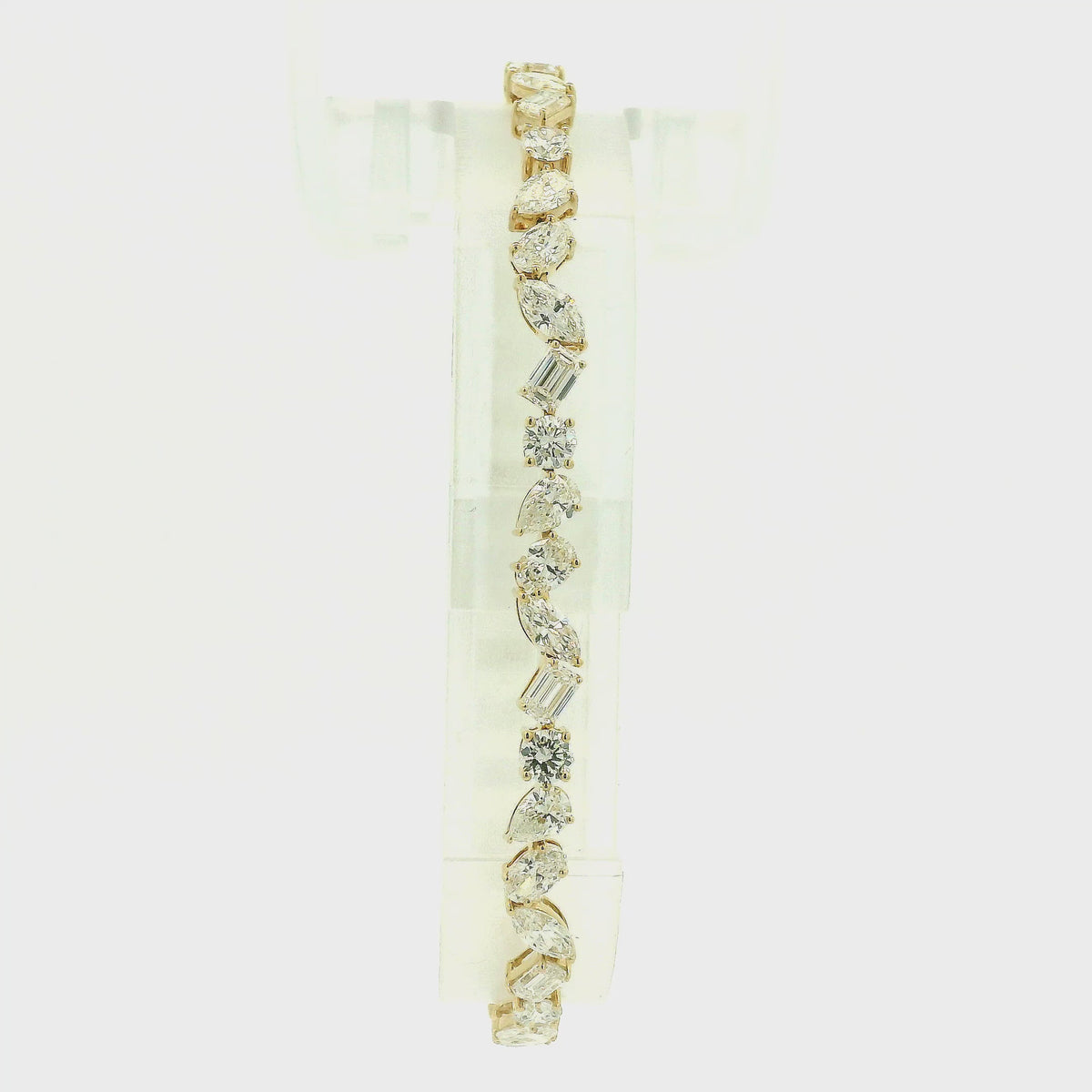 A Yellow Gold Tennis Bracelet with Natural Pear, Round, Emerald, Marquise & Oval Cut Diamonds at Forever Rox Fine Jewelry, Lake Tahoes Best Jewelry Store