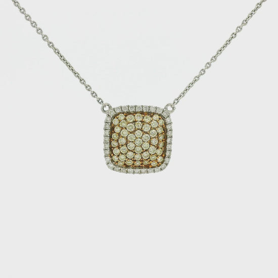A White Gold Pendant with pavé set round cut natural Yellow & White Diamonds with a chain attached at Forever Rox Fine Jewelry, Lake Tahoes Best Jewelry Store