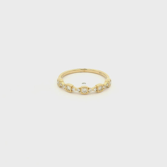 A Yellow Gold Band with bezel set round cut natural diamonds and prong set diamonds at Forever Rox Fine Jewelry, Lake Tahoes Best Jewelry Store
