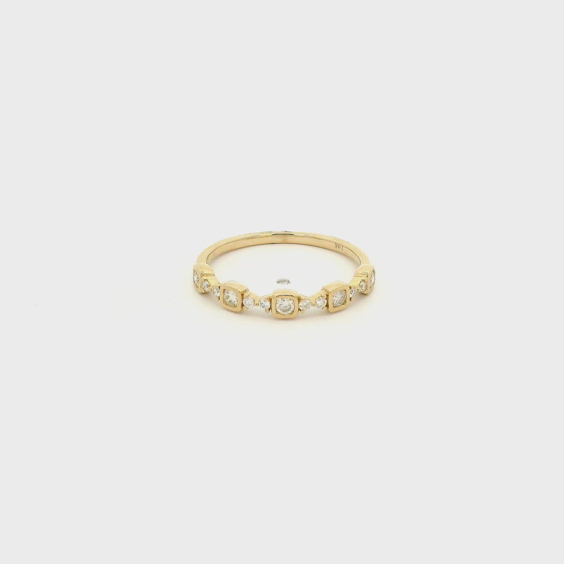 A Yellow Gold Band with bezel set round cut natural diamonds and prong set diamonds at Forever Rox Fine Jewelry, Lake Tahoes Best Jewelry Store
