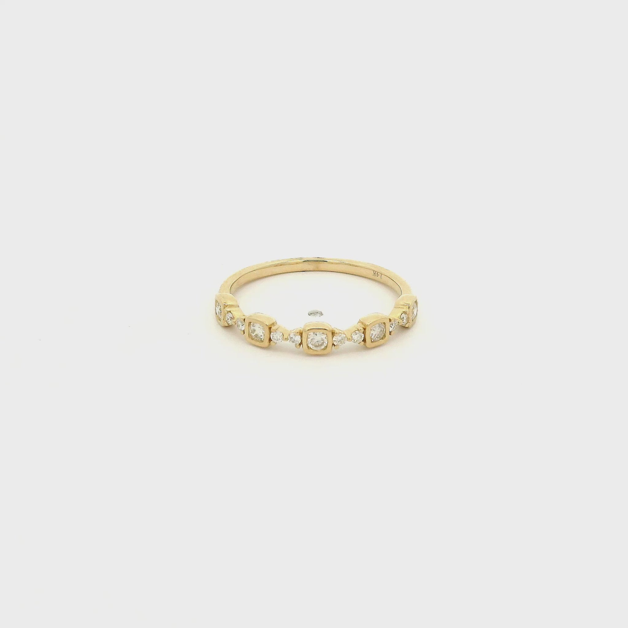 A Yellow Gold Band with bezel set round cut natural diamonds and prong set diamonds at Forever Rox Fine Jewelry, Lake Tahoes Best Jewelry Store
