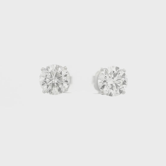A Pair of White Stud Gold Earrings Natural Round Cut 3.01ct Each Diamonds at Forever Rox Fine Jewelry, Lake Tahoes Best Jewelry Store