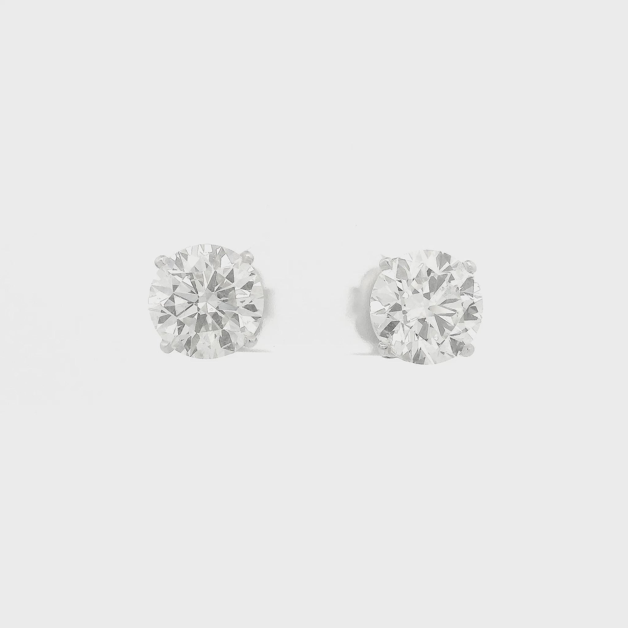 A Pair of White Stud Gold Earrings Natural Round Cut 3.01ct Each Diamonds at Forever Rox Fine Jewelry, Lake Tahoes Best Jewelry Store