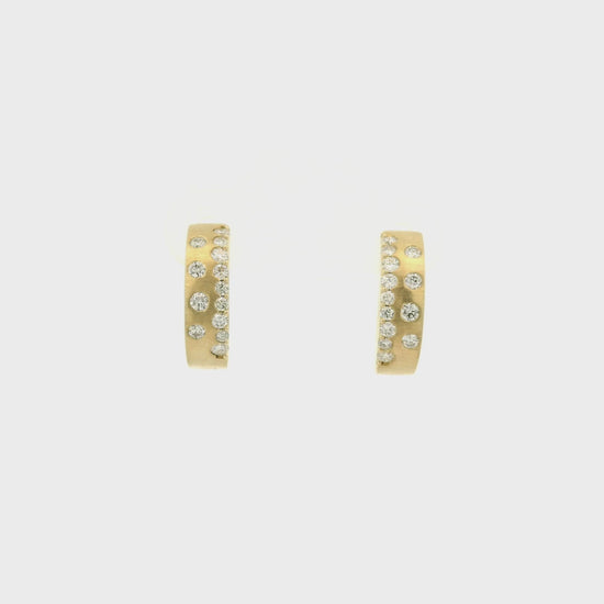 A Pair of Yellow Gold Hoop Earrings with flush set round cut natural Diamonds at Forever Rox Fine Jewelry, Lake Tahoes Best Jewelry Store
