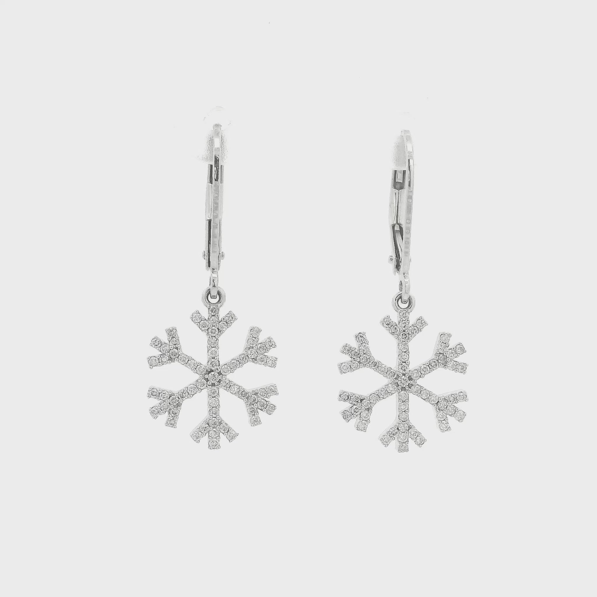A Pair of White Gold Dangle Earrings natural diamond snowflakes at Forever Rox Fine Jewelry, Lake Tahoes Best Jewelry Store