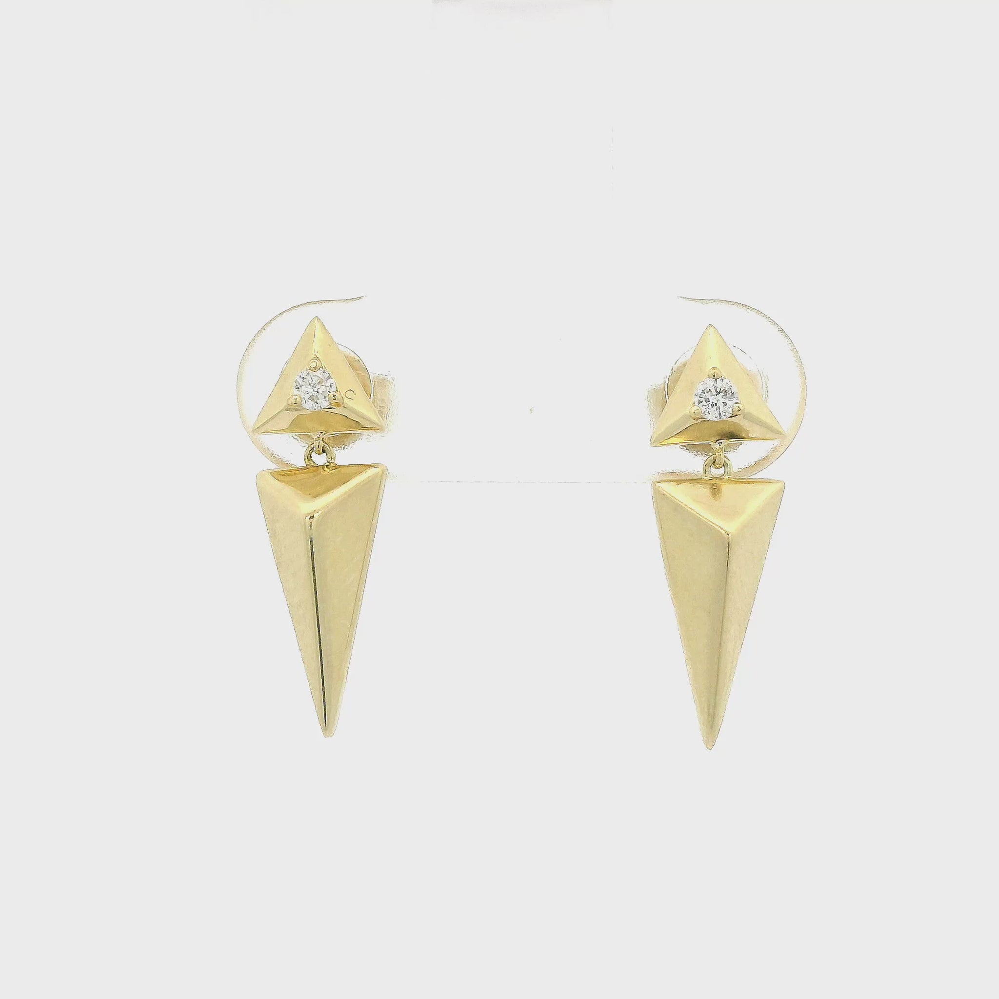 A Pair of Yellow Gold Triangle Studs with a spike dangling down and a diamond set in the triangle at Forever Rox Fine Jewelry, Lake Tahoes Best Jewelry Store