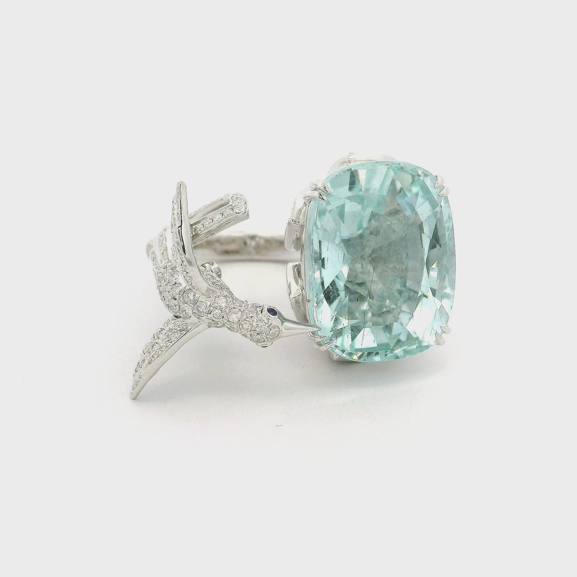 A White Gold Ring with a Natural Diamond bird drinking from a cushion cut Natural Diamond Pond at Forever Rox Fine Jewelry, Lake Tahoes Best Jewelry Store