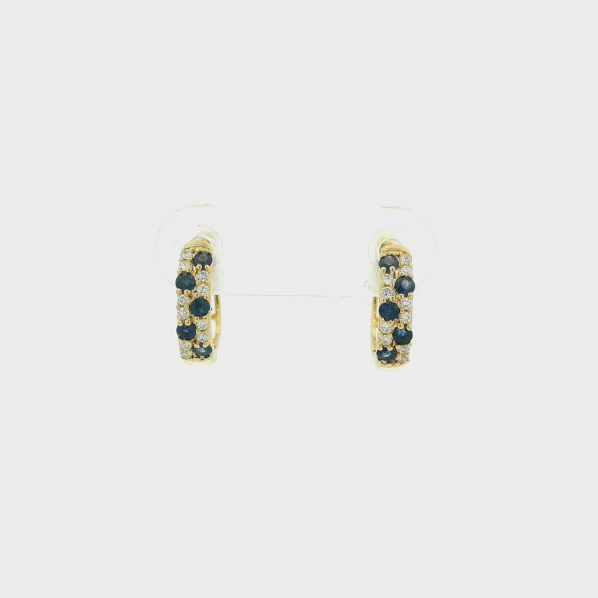 A Pair of Yellow Hoop Gold Earrings with natural Sapphires & Diamonds at Forever Rox Fine Jewelry, Lake Tahoes Best Jewelry Store