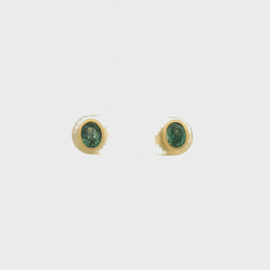 A Pair of Yellow Gold Earrings with bezel set oval cut natural Montana Sapphires at Forever Rox Fine Jewelry, Lake Tahoes Best Jewelry Store