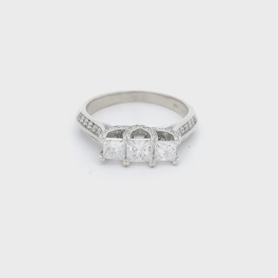 Three Princess cut diamonds and round diamonds set in a white gold ring at Forever Rox Fine Jewelry