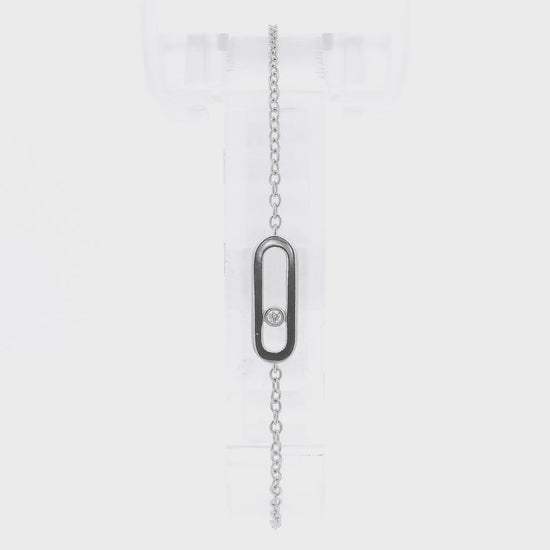 A White Gold Chain Bracelet with a oval in the senter and a single round cut natural Diamond offset in the center at Forever Rox Fine Jewelry, Lake Tahoes Best Jewelry Store