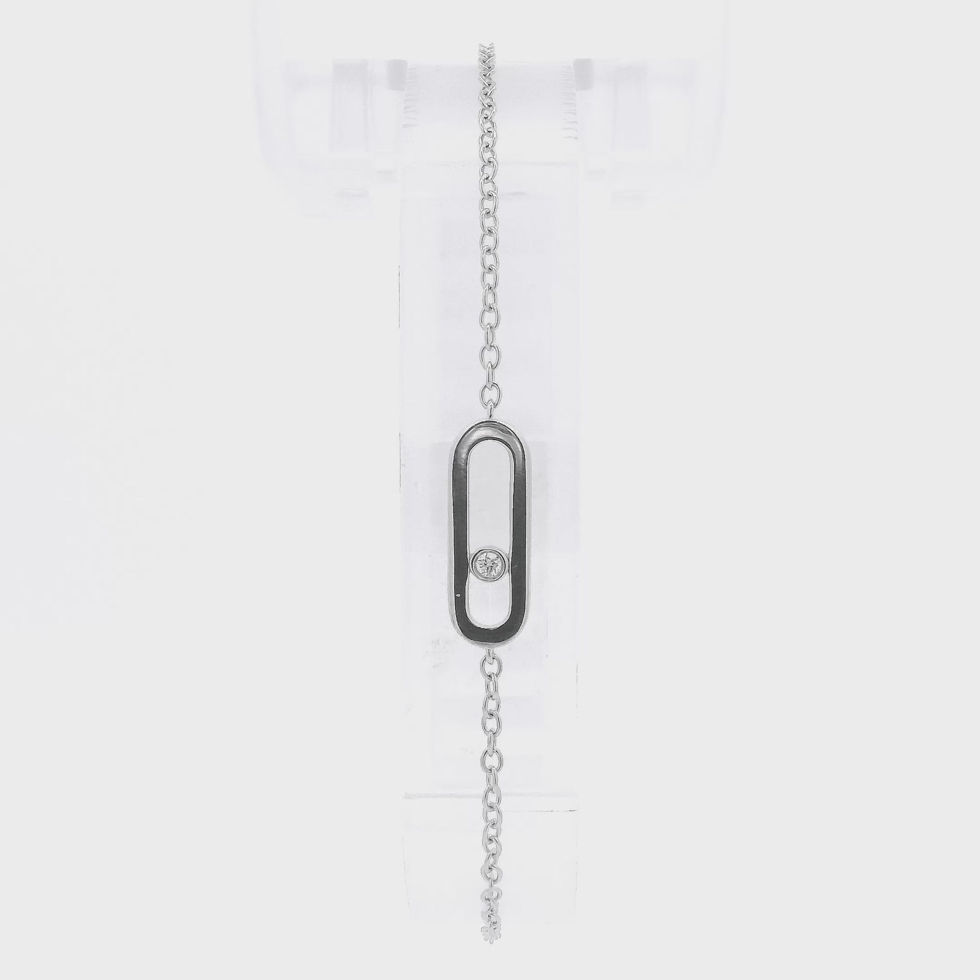 A White Gold Chain Bracelet with a oval in the senter and a single round cut natural Diamond offset in the center at Forever Rox Fine Jewelry, Lake Tahoes Best Jewelry Store