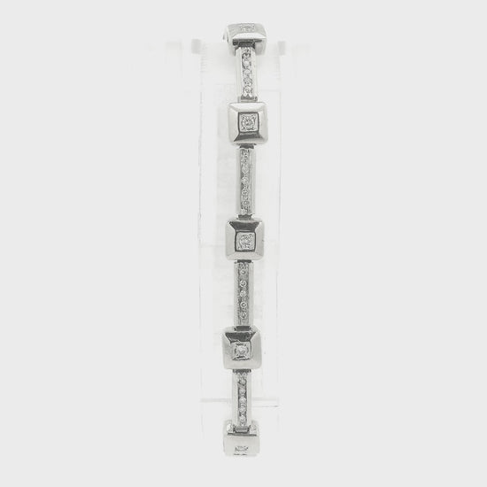 A White Gold diamond tennis bracelet with square bezel set & channel set diamonds at Forever Rox Fine Jewelry, Lake Tahoes Best Jewelry Store