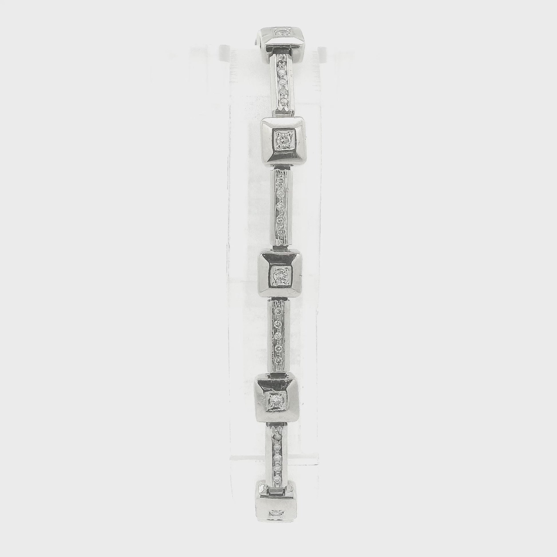 A White Gold diamond tennis bracelet with square bezel set & channel set diamonds at Forever Rox Fine Jewelry, Lake Tahoes Best Jewelry Store