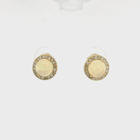A Pair of Yellow Gold Studs with prong set natural Ethiopian Opals in the center with a diamond halo at Forever Rox Fine Jewelry, Lake Tahoes Best Jewelry Store
