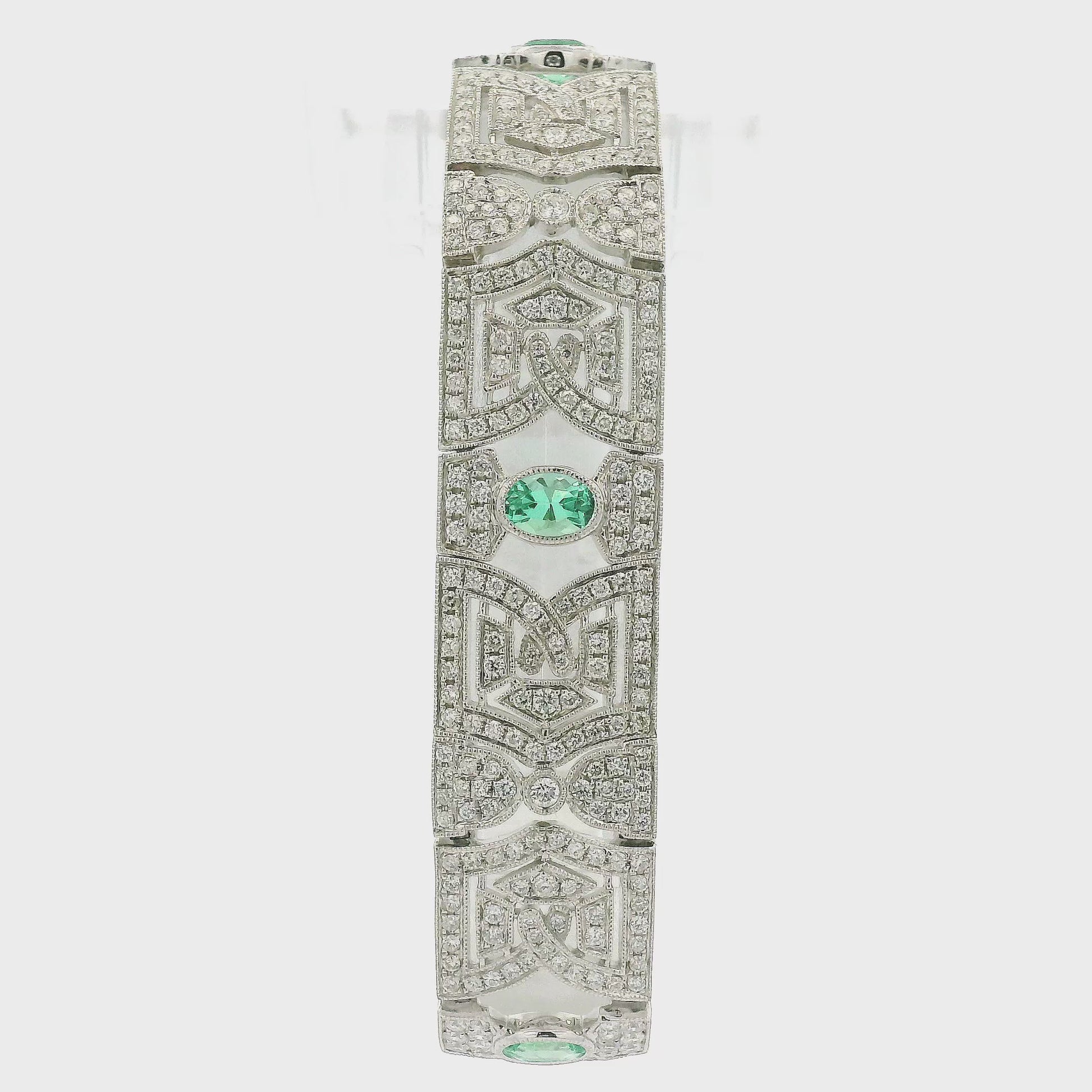 A White Gold Vintage Bracelet with bezel set oval cut natural Emeralds & natural diamonds at Forever Rox Fine Jewelry, Lake Tahoes Best Jewelry Store