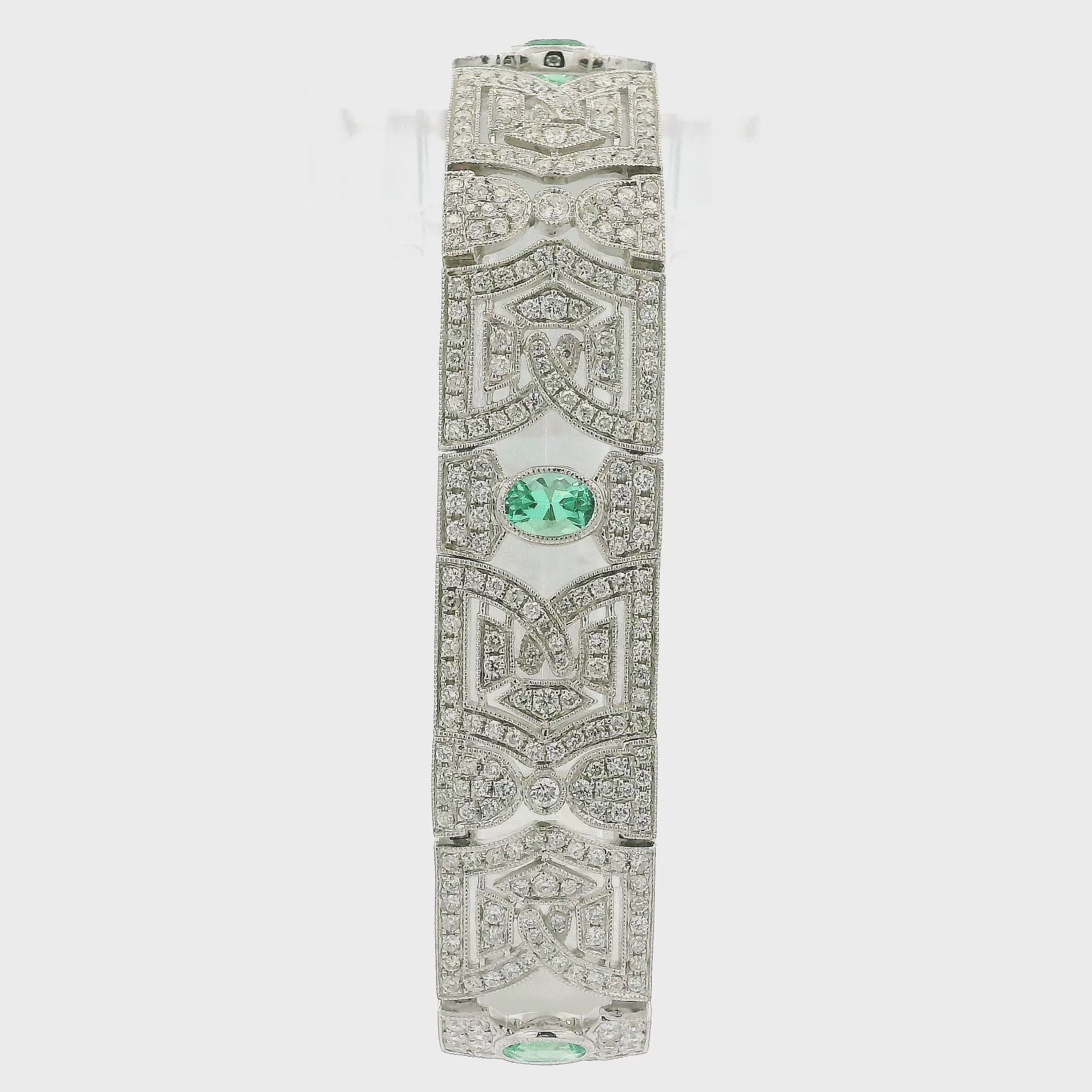 A White Gold Vintage Bracelet with bezel set oval cut natural Emeralds & natural diamonds at Forever Rox Fine Jewelry, Lake Tahoes Best Jewelry Store