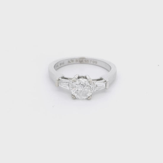 Round Cut Diamond & 2 Tapered Baguette Cut Diamonds set in a white gold ring at Forever Rox Fine Jewelry