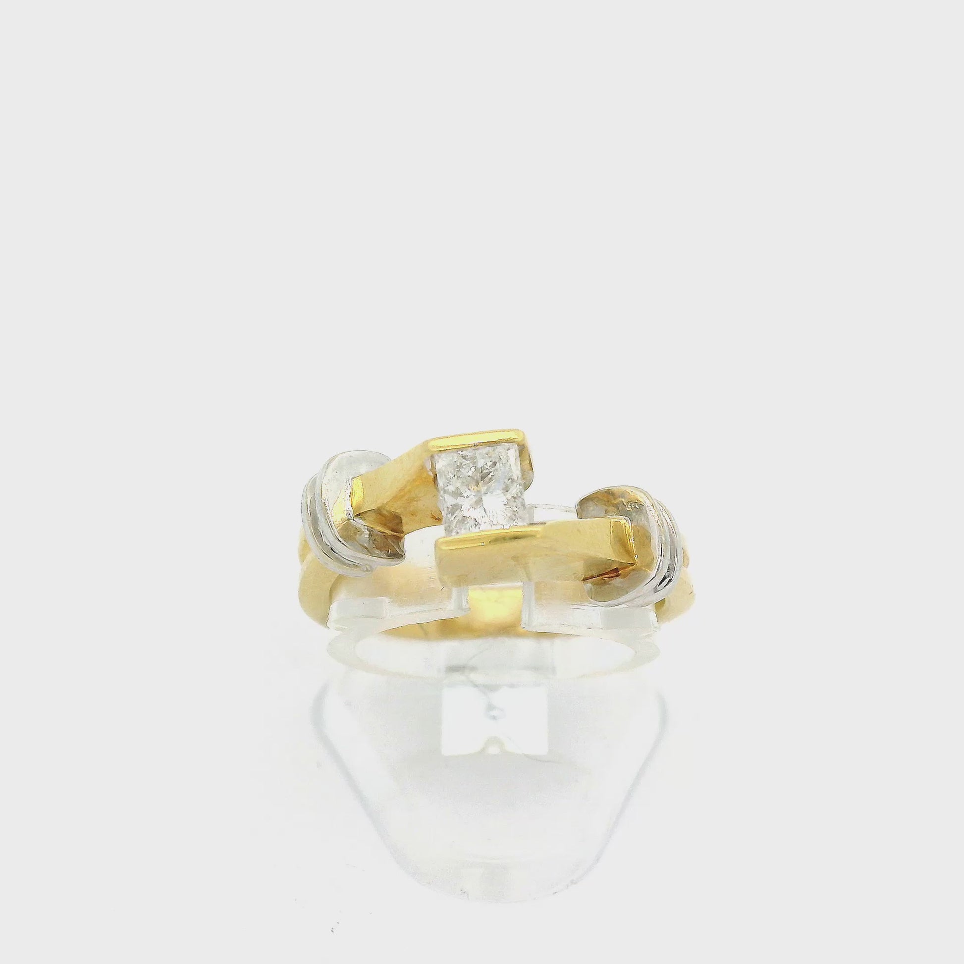 Gold and white gold ring with princess cut diamond set in the center at Forever Rox Fine Jewelry