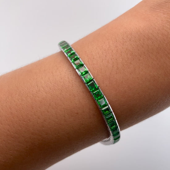 A Platinum Bracelet with square step cut natural Tsavorite Garnets at Forever Rox Fine Jewelry, Lake Tahoes Best Jewelry Store