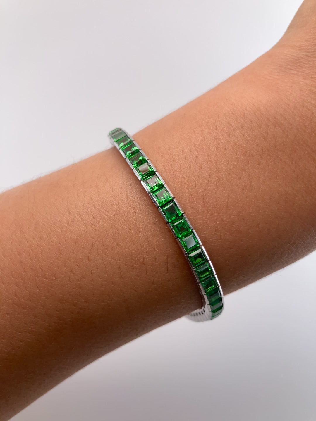 A Platinum Bracelet with square step cut natural Tsavorite Garnets at Forever Rox Fine Jewelry, Lake Tahoes Best Jewelry Store
