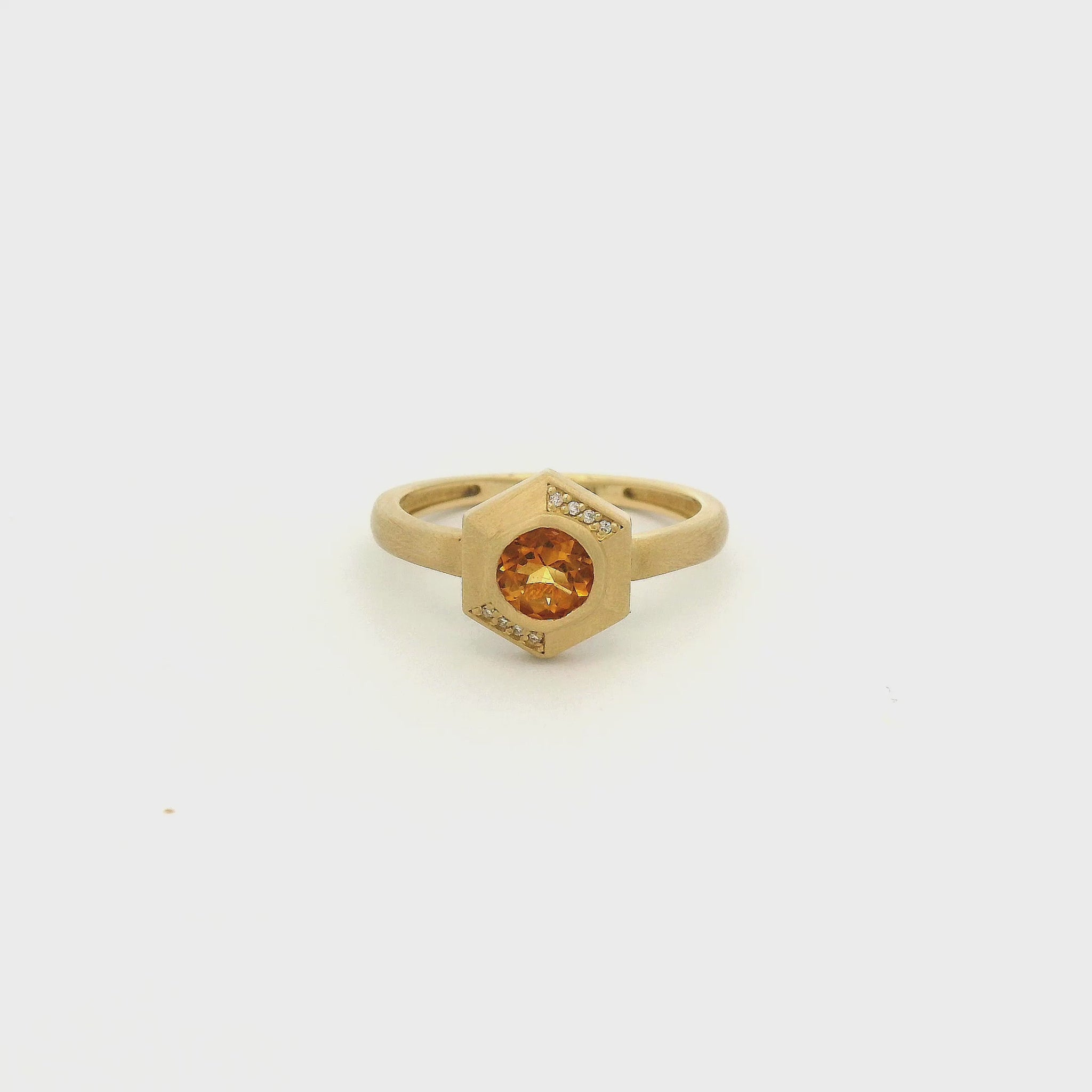 A Yellow Gold Ring with a bezel set round cut natural Citrine in the center with 8 diamonds flush set in the hexagon bezel at Forever Rox Fine Jewelry, Lake Tahoes Best Jewelry Store
