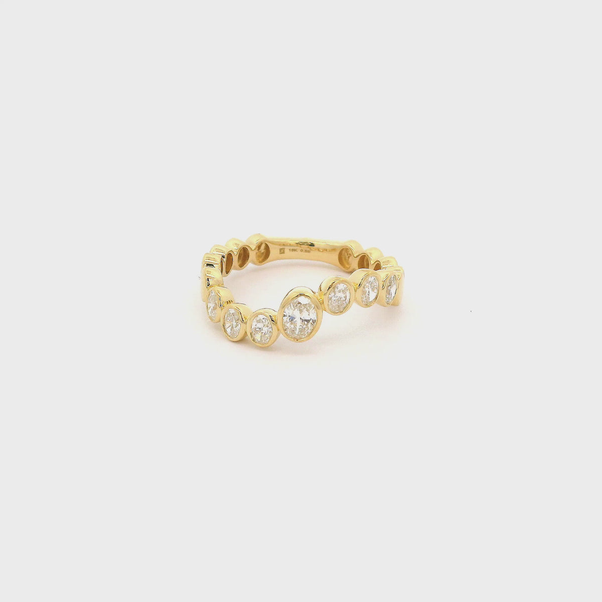 A Yellow Gold Ring with bezel set oval cut natural Diamonds at Forever Rox Fine Jewelry, Lake Tahoes Best Jewelry Store
