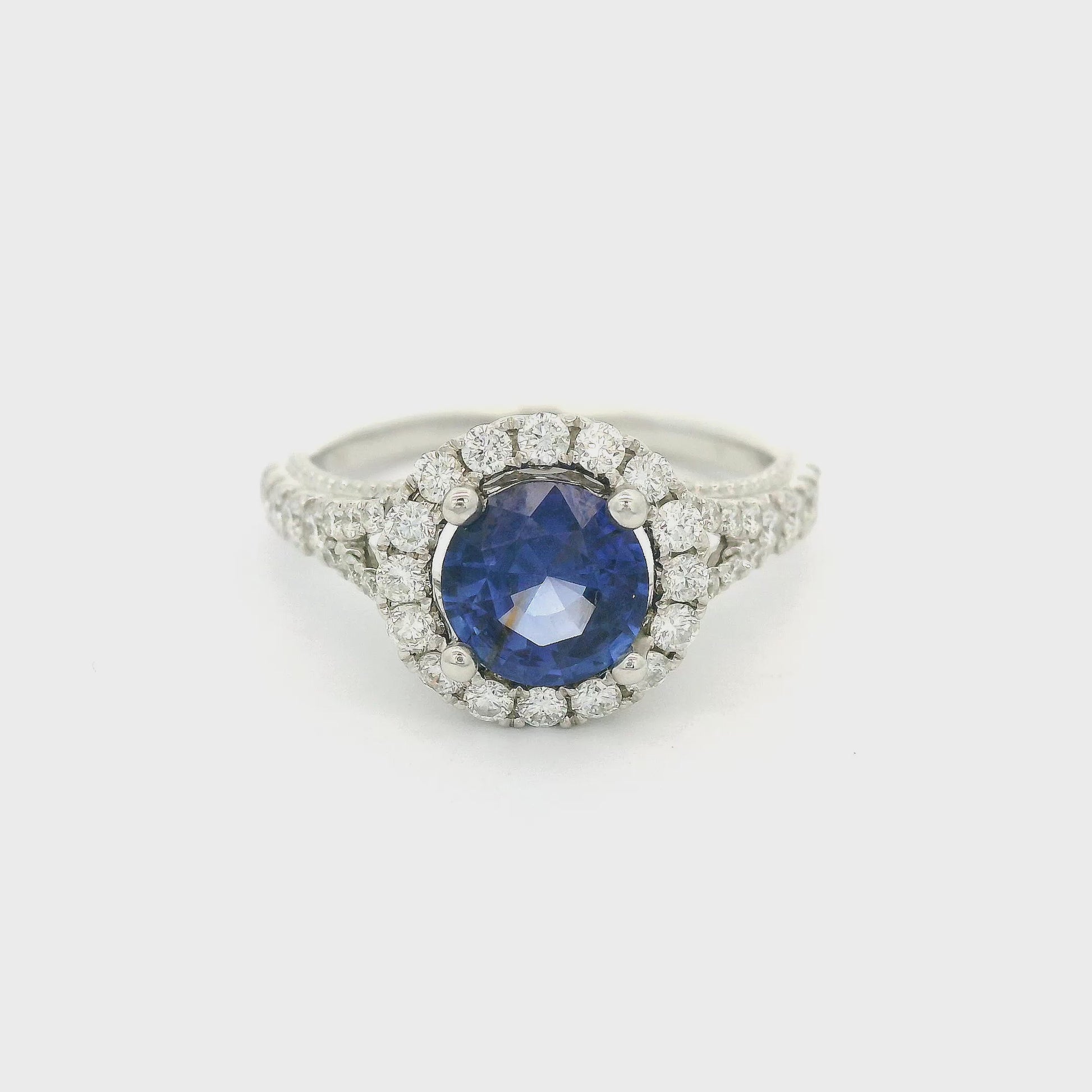 White Gold Ring with Blue Round Cut Sapphire & Diamonds with a Filigree Design at Forever Rox Fine Jewelry