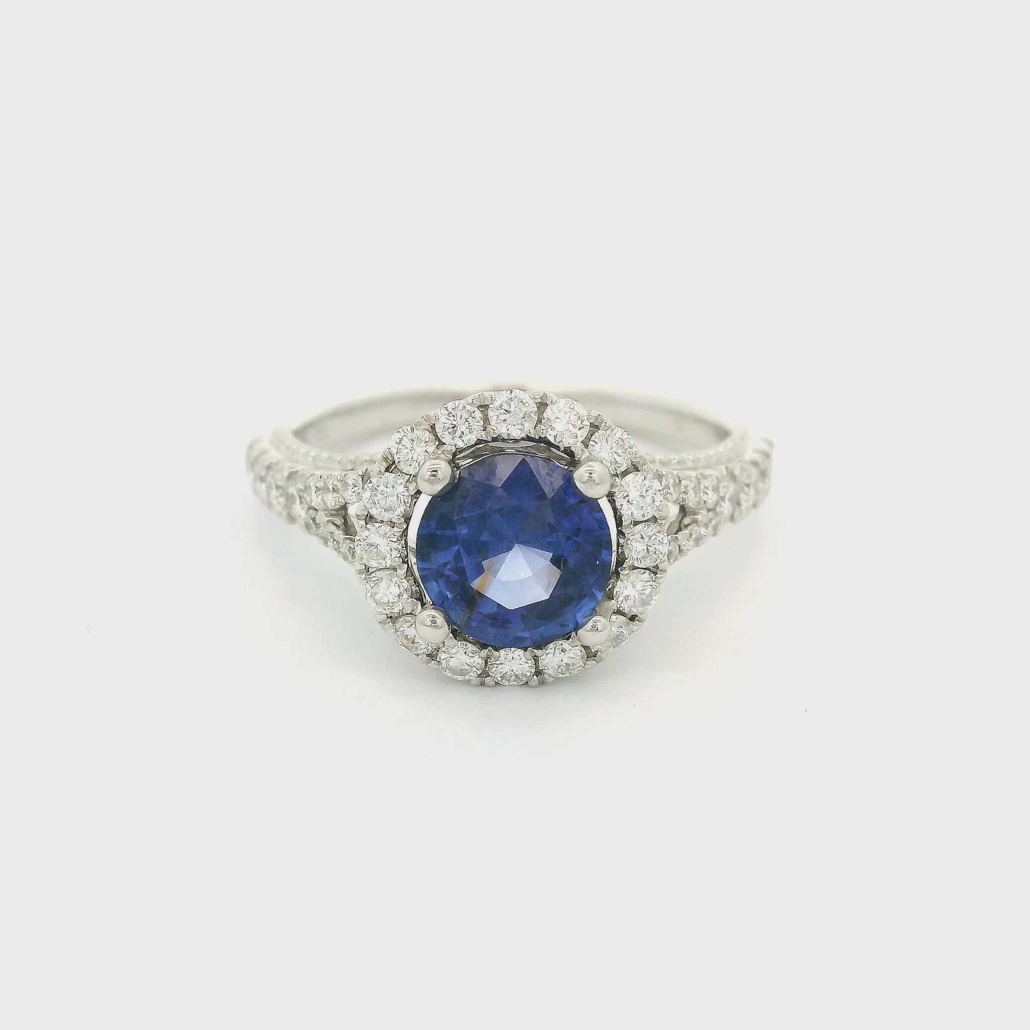 White Gold Ring with Blue Round Cut Sapphire & Diamonds with a Filigree Design at Forever Rox Fine Jewelry