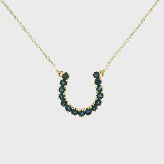 Yellow Gold Horseshoe Pendant with natural Sapphires or Natural Emeralds at Forever Rox Fine Jewelry, Lake Tahoes Best Jewelry Store