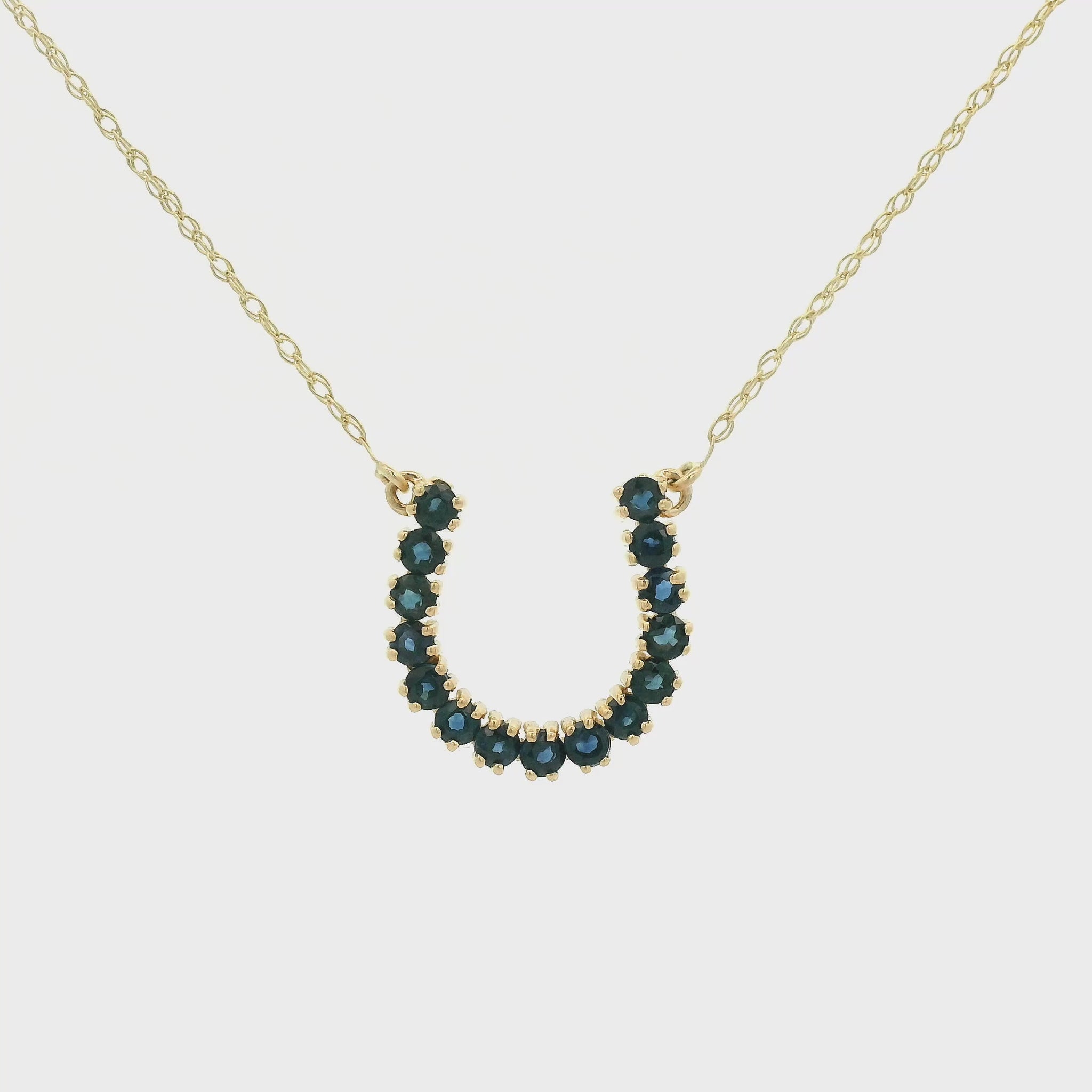 Yellow Gold Horseshoe Pendant with natural Sapphires or Natural Emeralds at Forever Rox Fine Jewelry, Lake Tahoes Best Jewelry Store