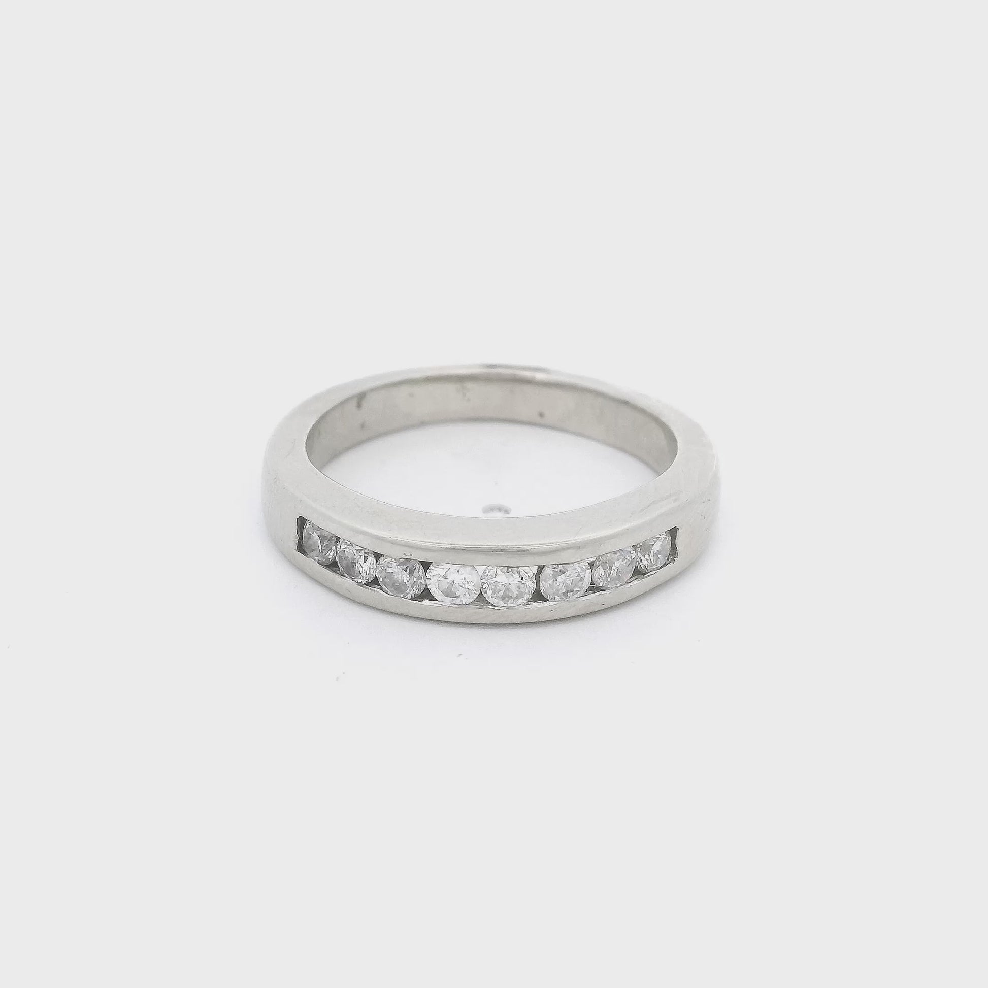 White Gold band with eight channel set round cut diamonds at Forever Rox Fine Jewelry