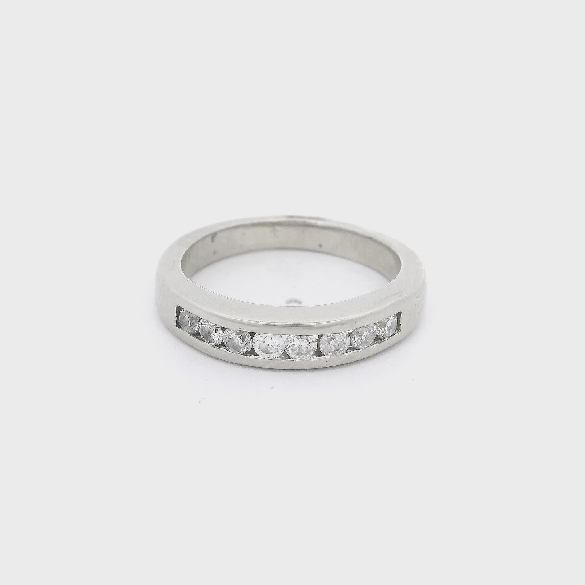 White Gold band with eight channel set round cut diamonds at Forever Rox Fine Jewelry