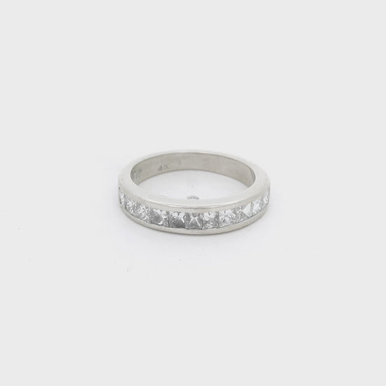 White Gold Band with channel set princess cut diamonds going halfway around the band at Forever Rox Fine Jewelry