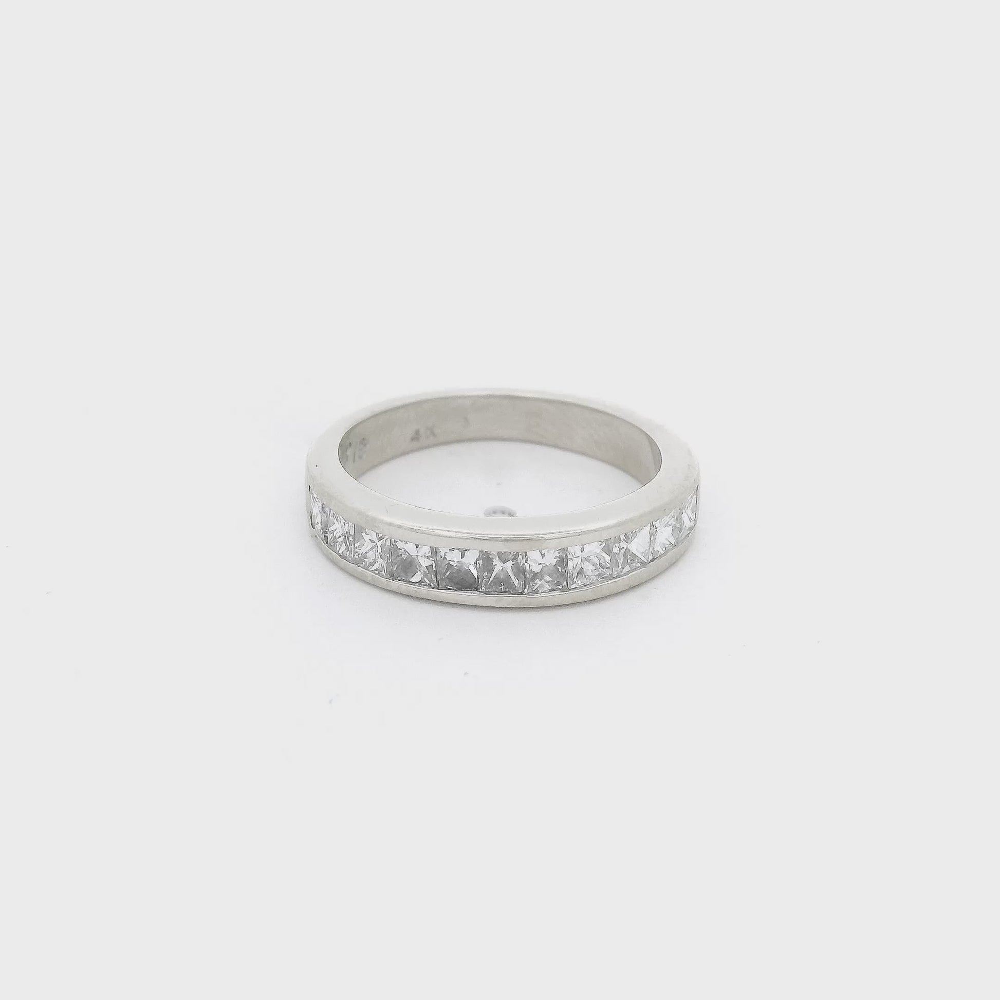 White Gold Band with channel set princess cut diamonds going halfway around the band at Forever Rox Fine Jewelry