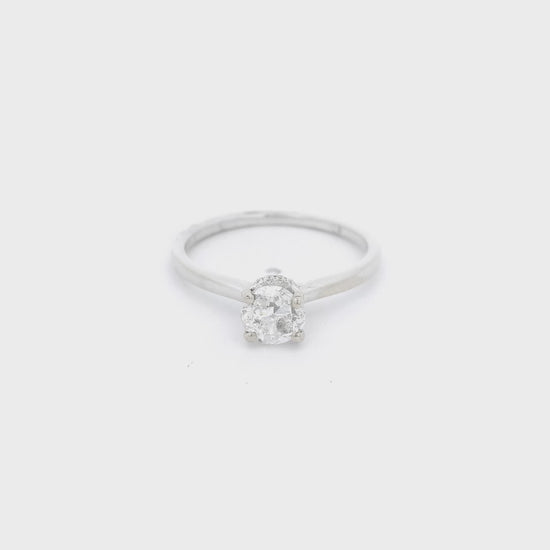 White gold ring with a solitaire set diaond and diamonds around head at Forever Rox Fine Jewelry