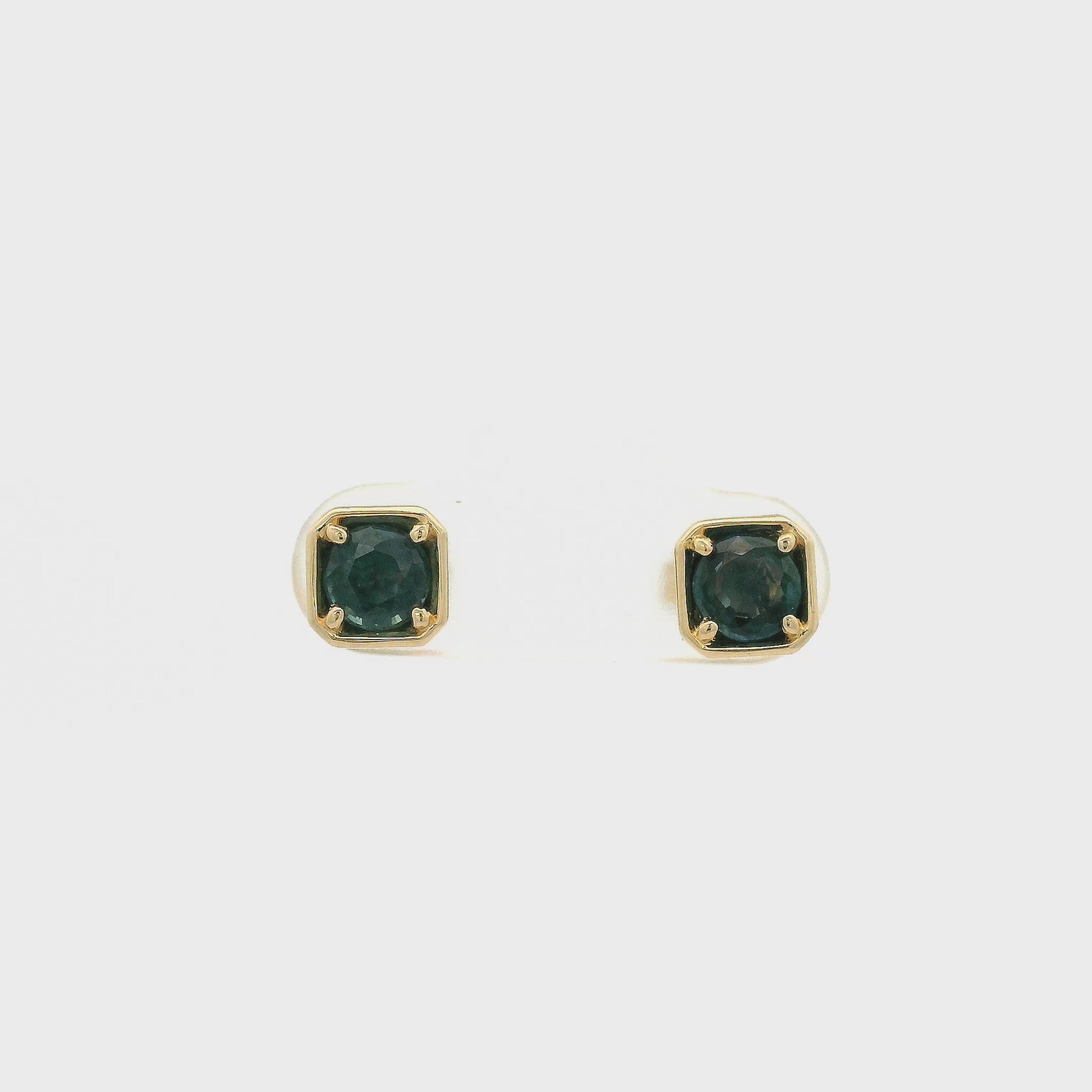 A Pair of Yellow Gold Earrings with bezel set fancy cut natural Sapphire in the center with chain attached at Forever Rox Fine Jewelry, Lake Tahoes Best Jewelry Store