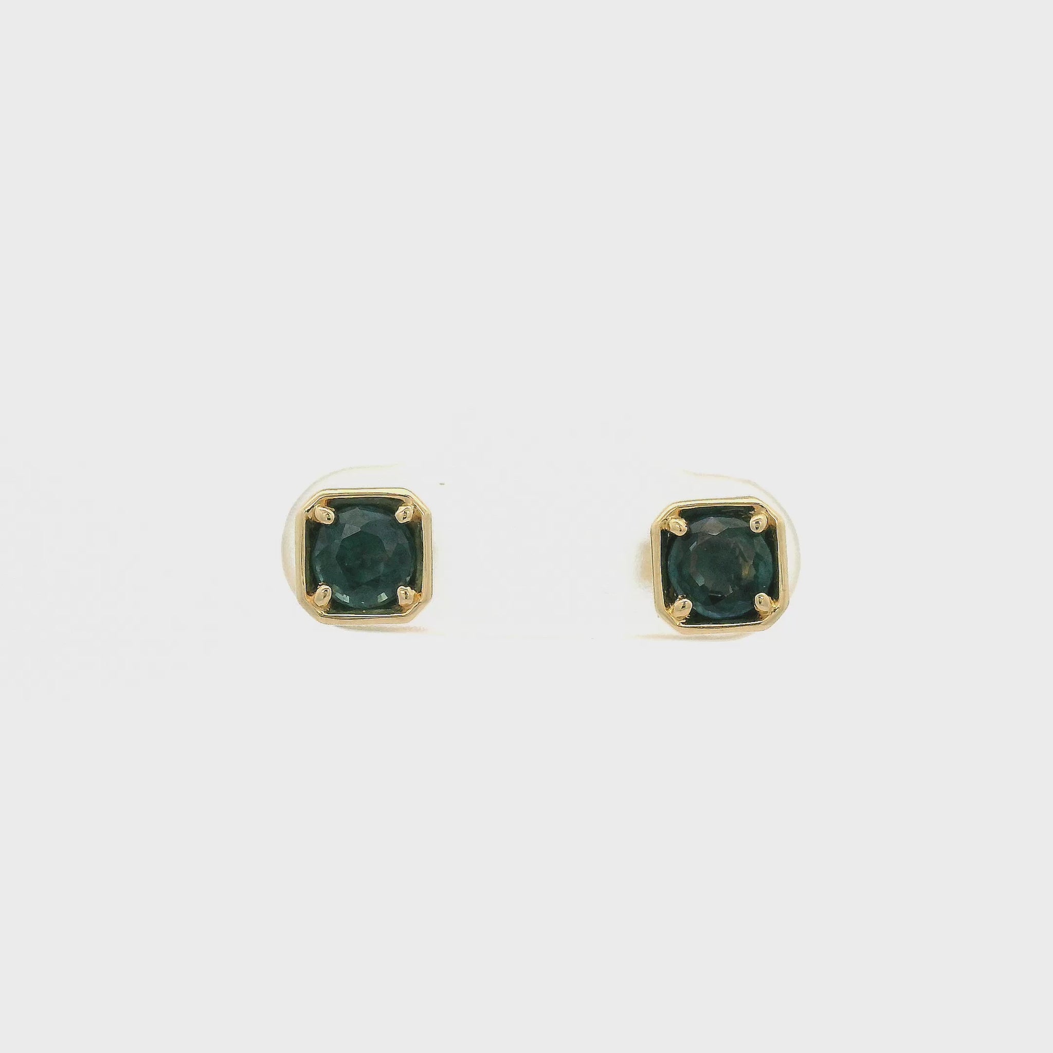 A Pair of Yellow Gold Earrings with bezel set fancy cut natural Sapphire in the center with chain attached at Forever Rox Fine Jewelry, Lake Tahoes Best Jewelry Store